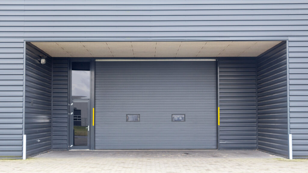Entrance of modern business unit; Shutterstock ID 173248814; PO: Zeus O'Neil Metal Buildings & Roofing | 6 Valuable Metal Building Advantages Worth Knowing